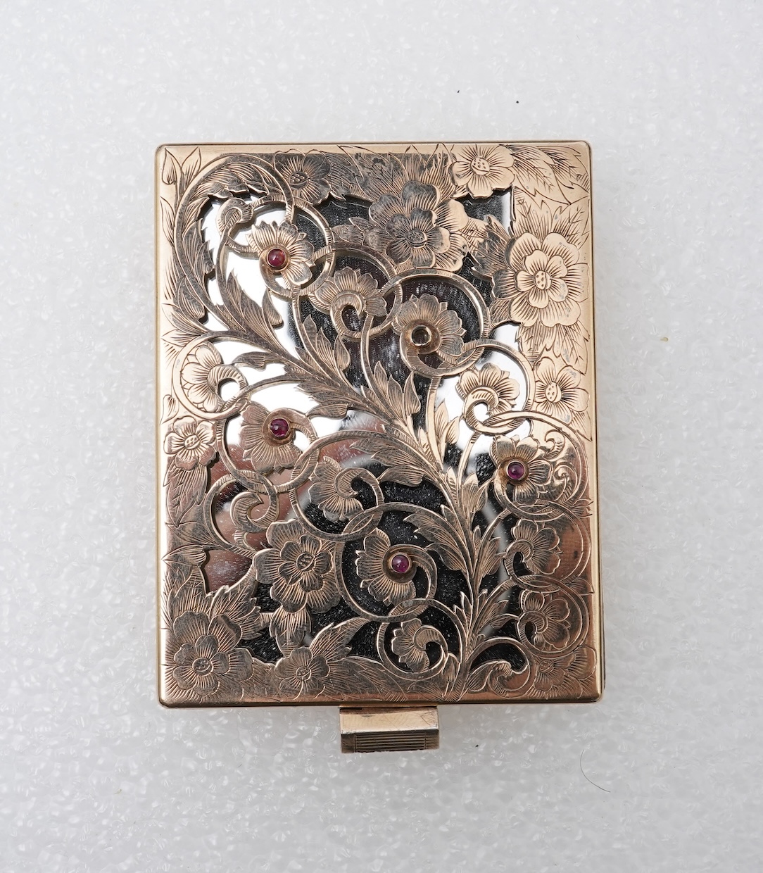 Boucheron, a silver gilt and ruby vanity case, France, 1940s